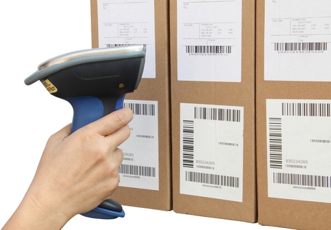 Warehouse shipping labels being scanned